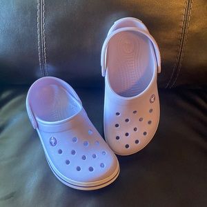 Light purple crocs.  Big kid size 5
